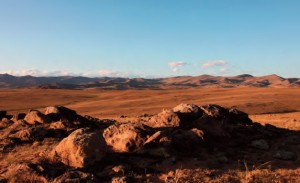 Mongolia, vast dry steppe landscape.