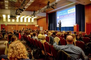 James speaking to the audience, Functional Forum, San Francisco, California, April 2016; Networking with colleagues before the Functional Forum