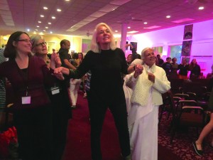 Attendees dancing to “How Can You Mend a Broken Heart,” a restorative narrative-based song at ivoh Summit 2015. photography | Kenny Irby for ivoh