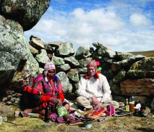 Preparing offerings to Pachamama at Pachatusan outside of Cusco