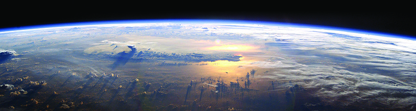 The Earth’s atmosphere, seen from above. Gaia theory shows how life on Earth and the environment developed together as one co-evolutionary system. Without the presence of life, the Earth’s atmosphere would be 98% carbon dioxide and the planet’s surface temperature would be between 466 and 644 F.